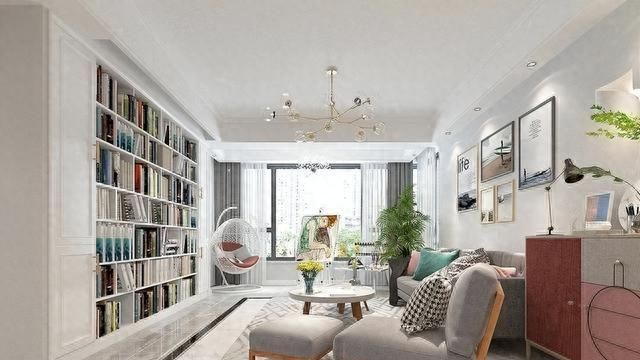 深圳夫妻巧改电视墙为书柜，满屋书香引热议