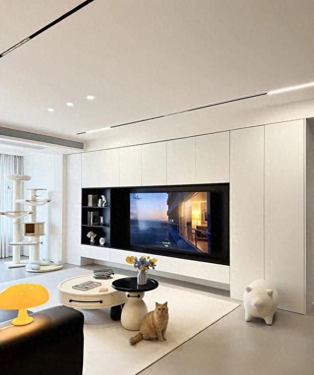 老公坚持把电视墙设计成满墙电视柜，入住后发现真香！ - 今日头条